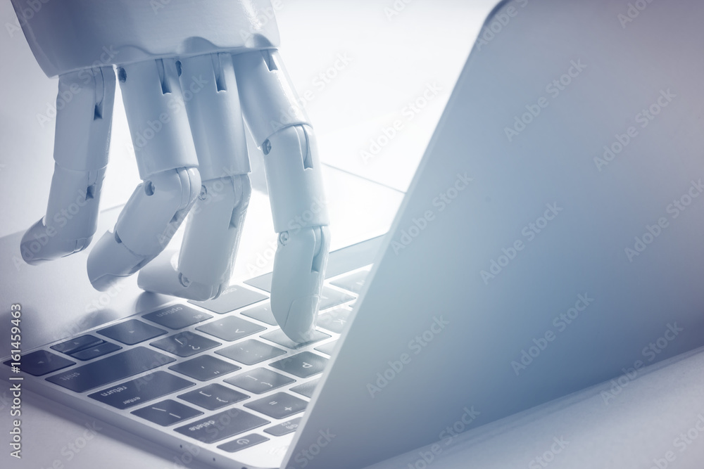 Chat bot , artificial intelligence , robo advisor , robotic concept. Robot finger point to laptop button. Blue tone.